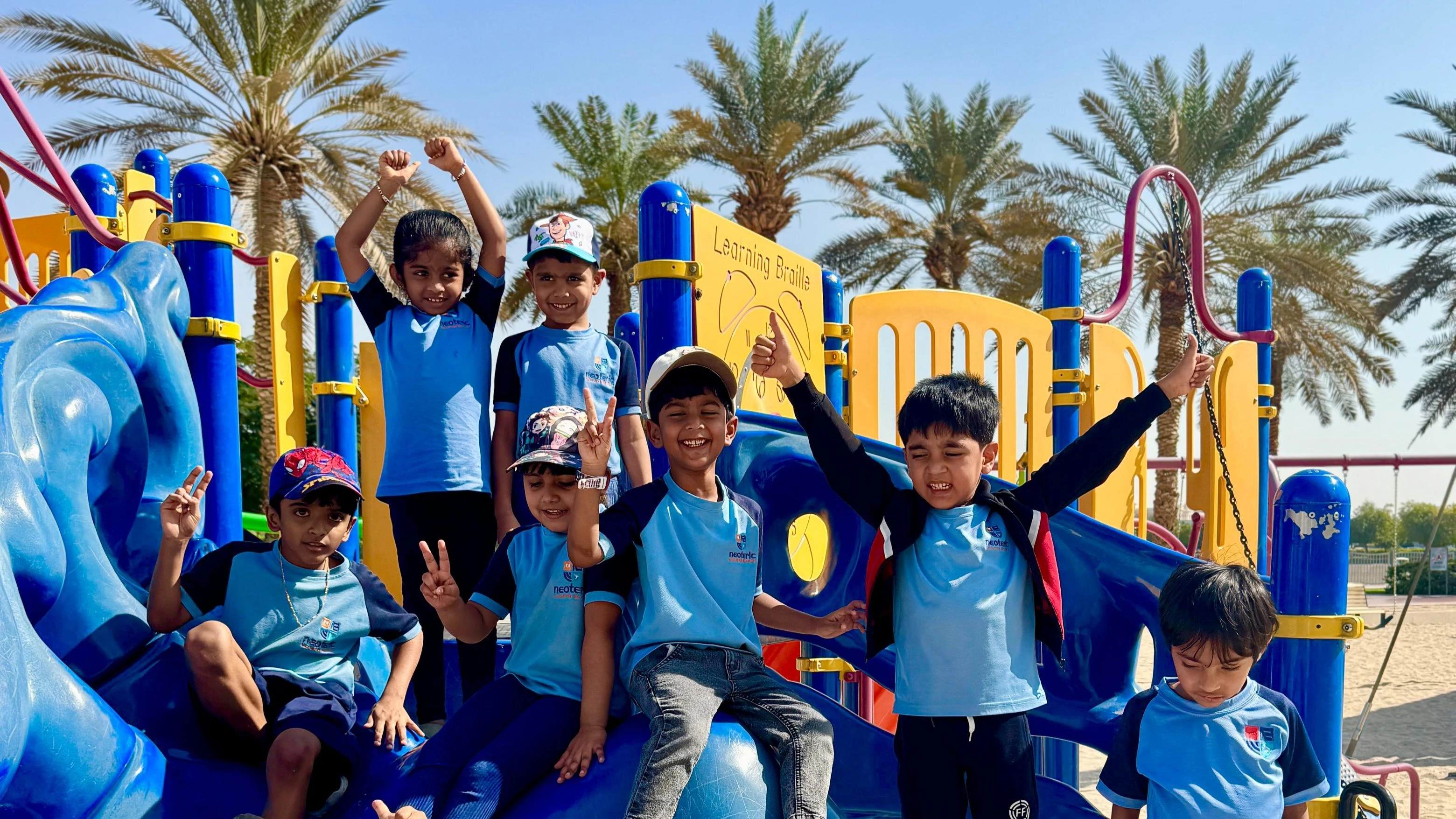 Neoteric Education kids having fun at the playground